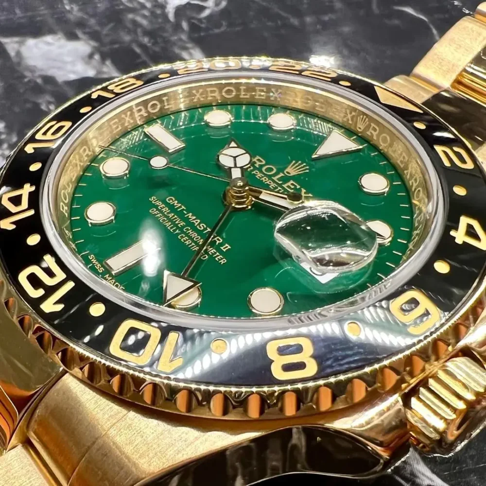 Rolex GMT-Master II “Green Dial” Yellow Gold
