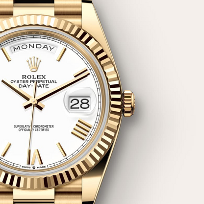 A- Rolex Day-Date 40 Oyster, 40 mm, yellow gold