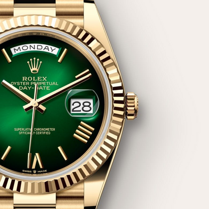 A- Rolex Day-Date 40 Oyster, 40 mm, yellow gold