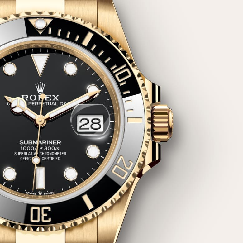 A- Rolex Submariner Date, 18k Yellow Gold, 41mm