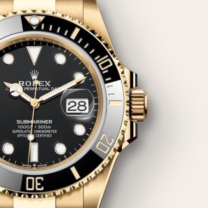 A- Rolex Submariner Date, 18k Yellow Gold, 41mm
