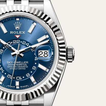B- Rolex Sky-Dweller Stainless Steel, Blue Index Dial, 42 mm