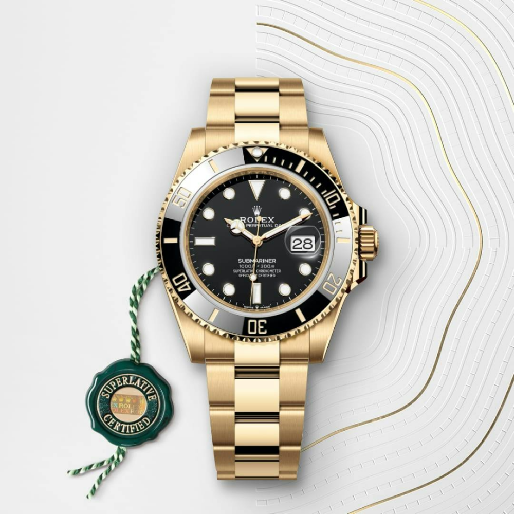 A- Rolex Submariner Date, 18k Yellow Gold, 41mm