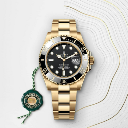 A- Rolex Submariner Date, 18k Yellow Gold, 41mm