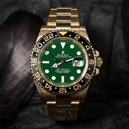 Rolex GMT-Master II “Green Dial” Yellow Gold