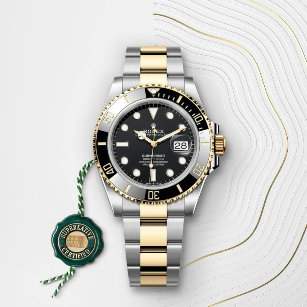 B- Rolex Submariner Date Oyster, 41 mm, Oystersteel and yellow gold