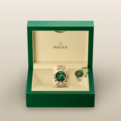 A- Rolex Day-Date 40 Oyster, 40 mm, yellow gold
