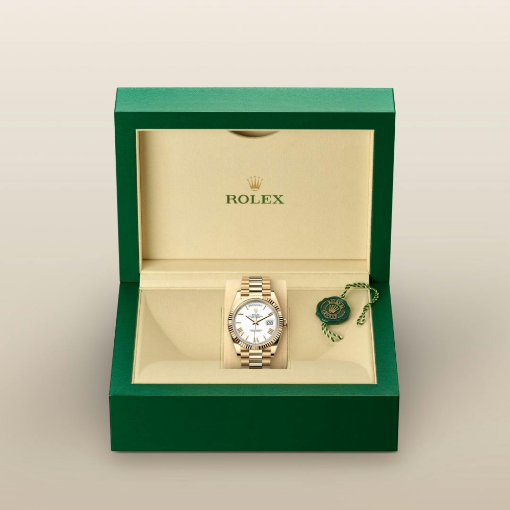 A- Rolex Day-Date 40 Oyster, 40 mm, yellow gold