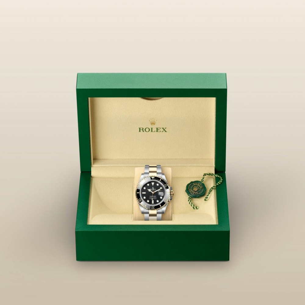 B- Rolex Submariner Date Oyster, 41 mm, Oystersteel and yellow gold