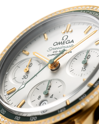 Speedmaster 38 38 mm, yellow gold on leather strap