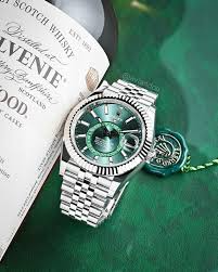 A- Rolex Sky-Dweller Stainless Steel, Green Index Dial, 42 mm