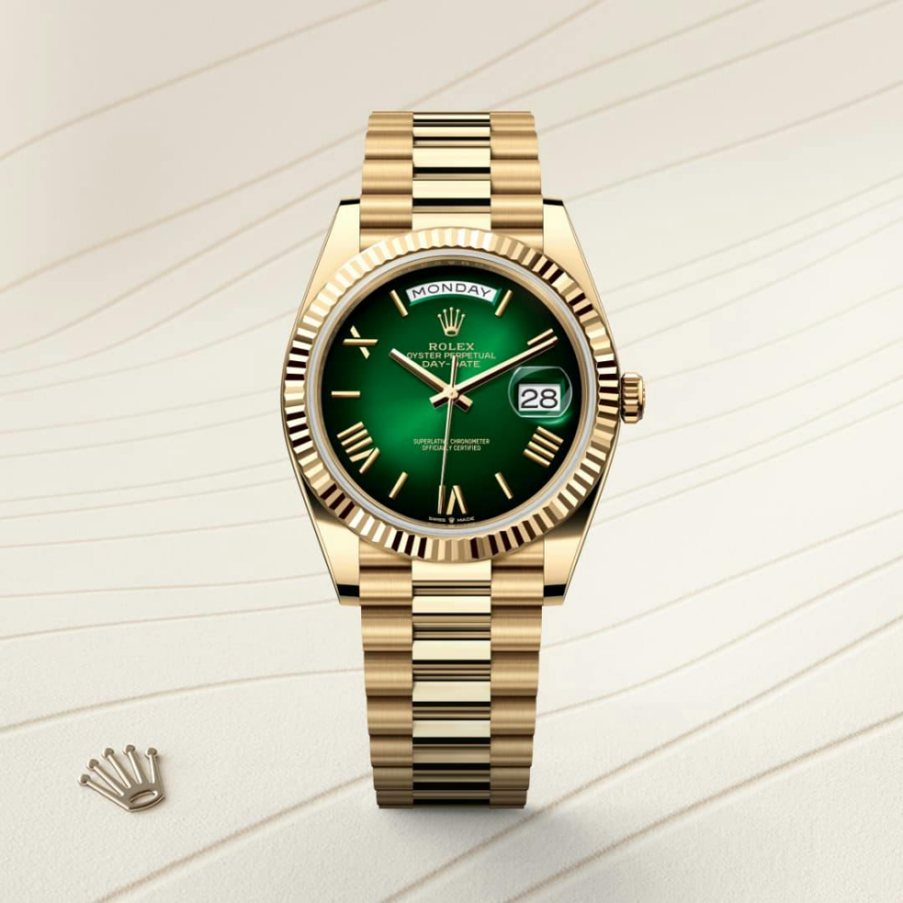 A- Rolex Day-Date 40 Oyster, 40 mm, yellow gold