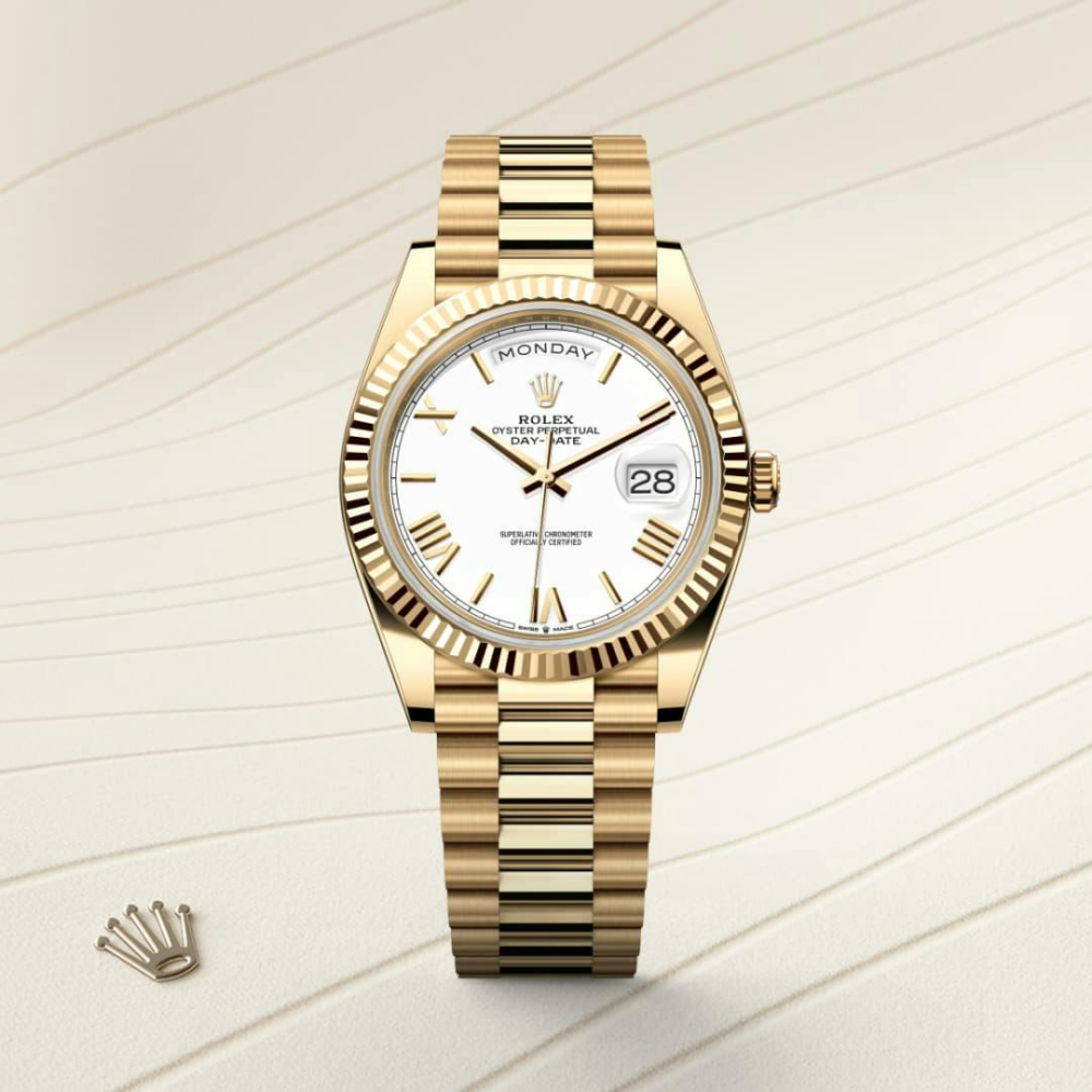 A- Rolex Day-Date 40 Oyster, 40 mm, yellow gold