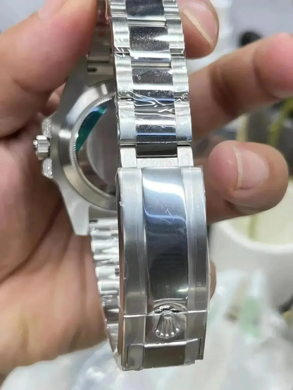 Rolex Submariner Date, 18K White Gold Diamonds Emerald