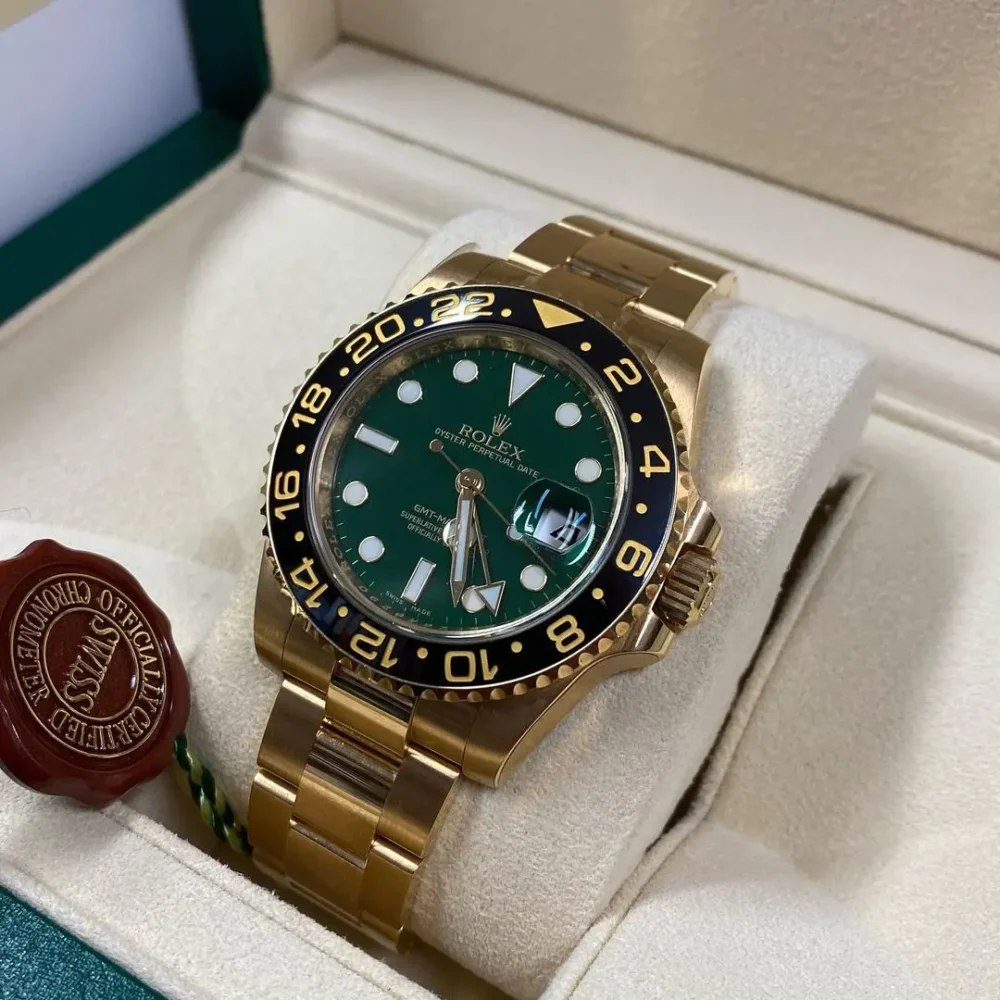 Rolex GMT-Master II “Green Dial” Yellow Gold