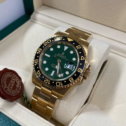 Rolex GMT-Master II “Green Dial” Yellow Gold