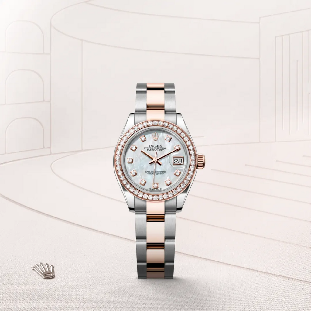 The Oyster Perpetual Lady-Datejust in Everose gold and Oystersteel features a diamond-set white mother-of-pearl dial