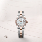 The Oyster Perpetual Lady-Datejust in Everose gold and Oystersteel features a diamond-set white mother-of-pearl dial