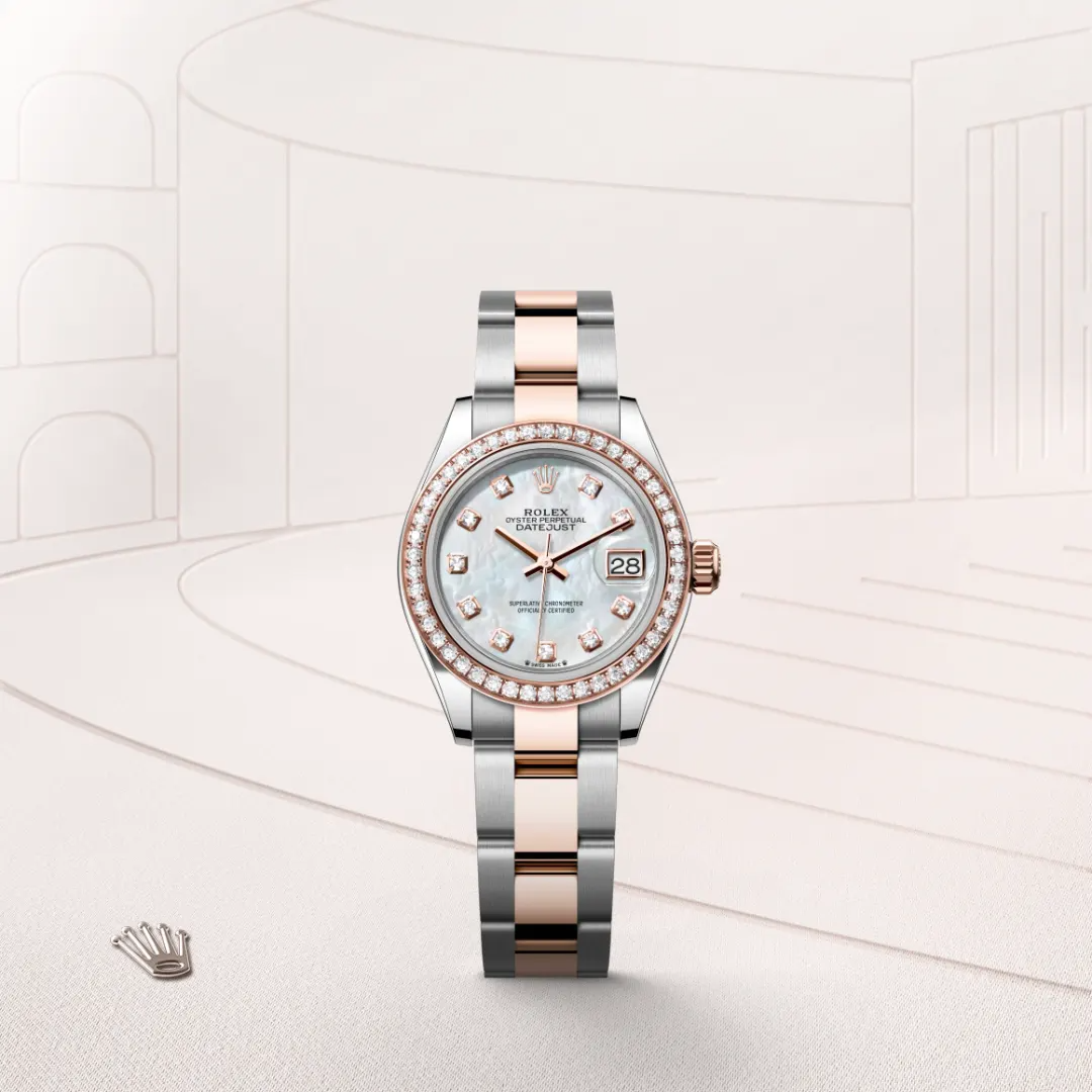 The Oyster Perpetual Lady-Datejust in Everose gold and Oystersteel features a diamond-set white mother-of-pearl dial