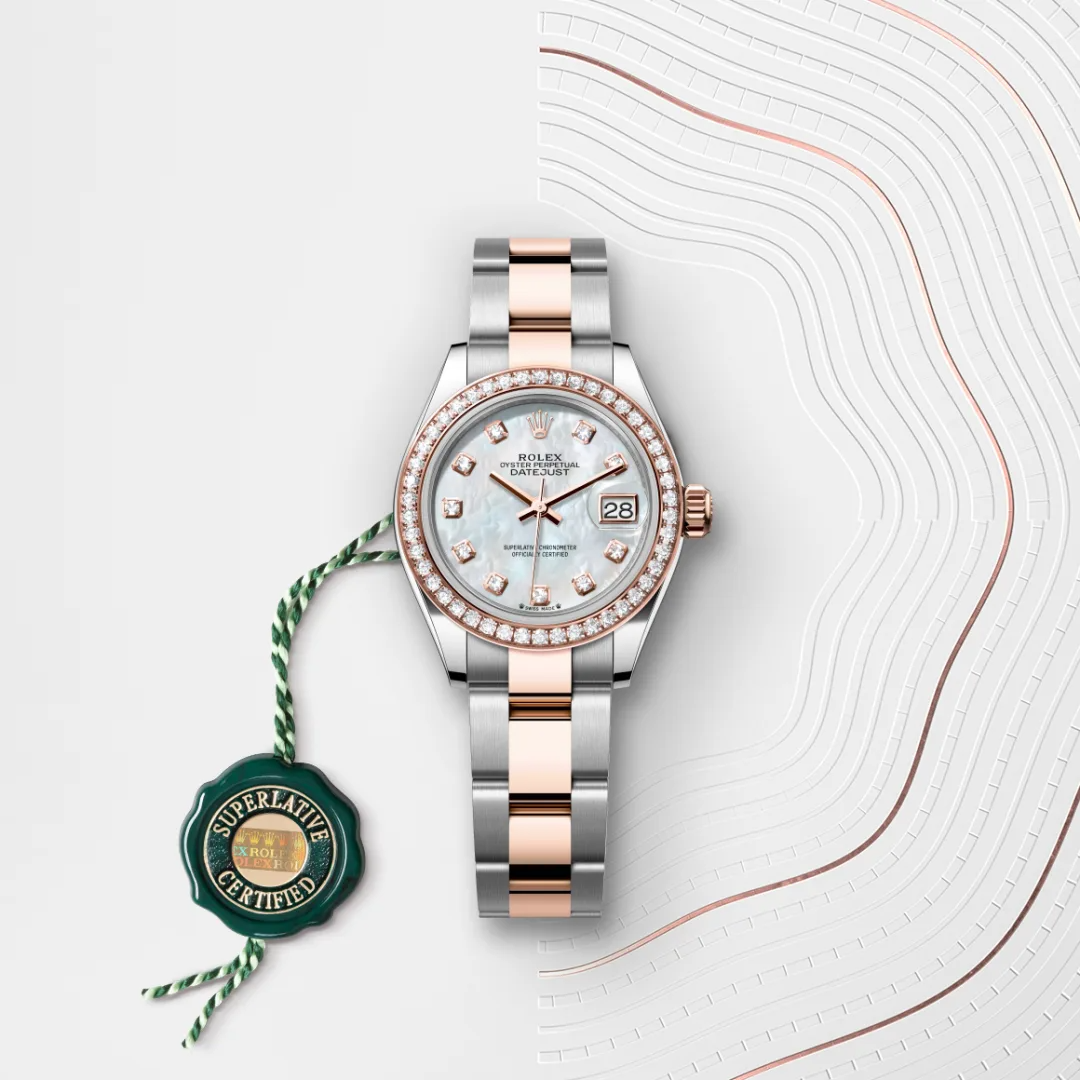 The Oyster Perpetual Lady-Datejust in Everose gold and Oystersteel features a diamond-set white mother-of-pearl dial