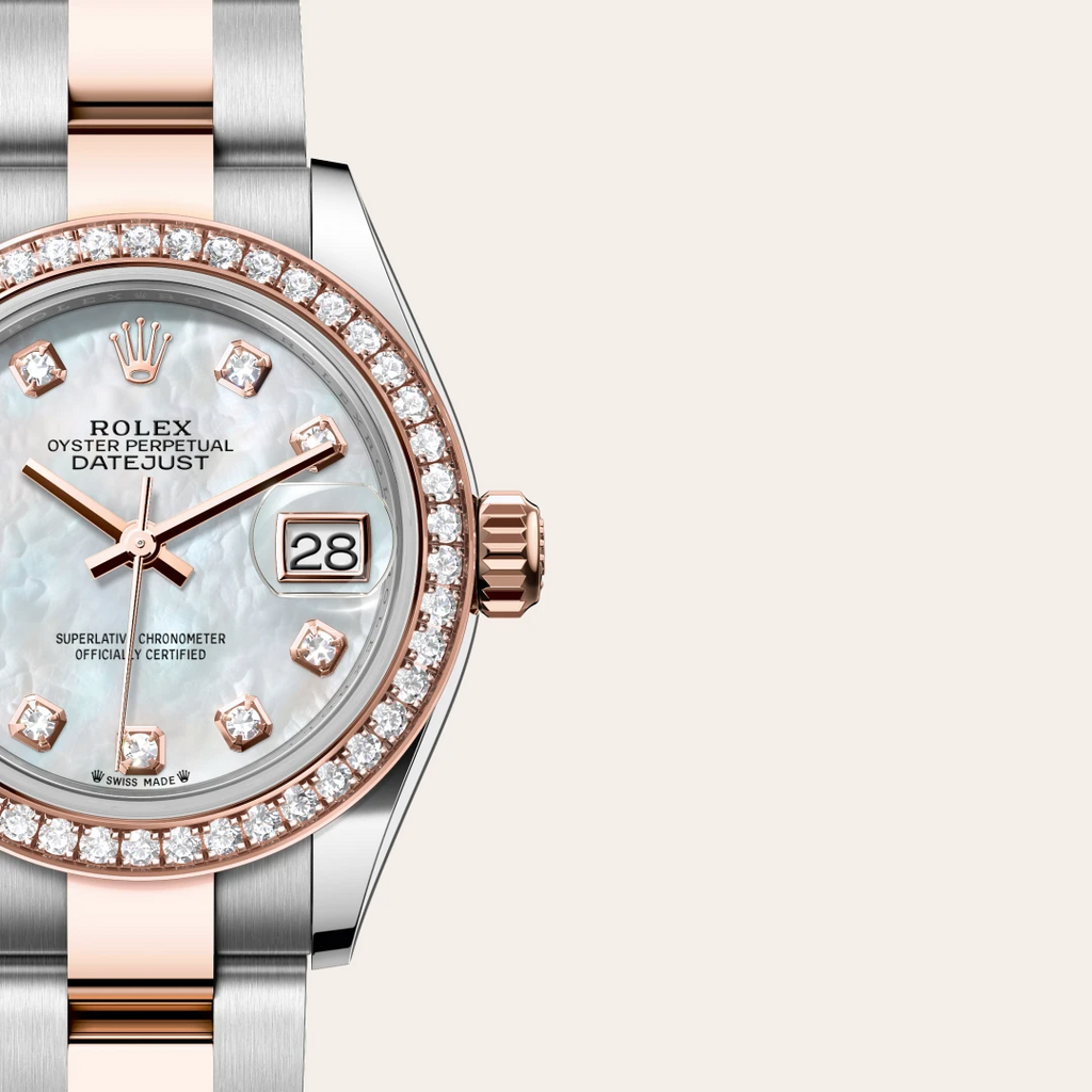 The Oyster Perpetual Lady-Datejust in Everose gold and Oystersteel features a diamond-set white mother-of-pearl dial
