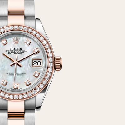 The Oyster Perpetual Lady-Datejust in Everose gold and Oystersteel features a diamond-set white mother-of-pearl dial